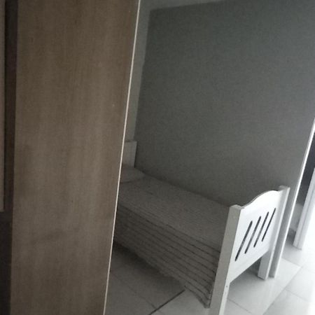 Cama Em Dormitorio Misto Brasilia Exterior foto